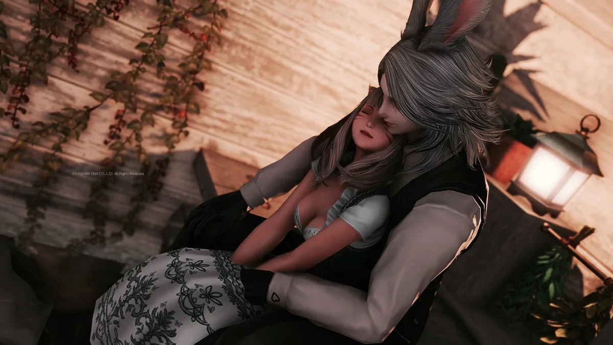 膝の上にのるミコッテ